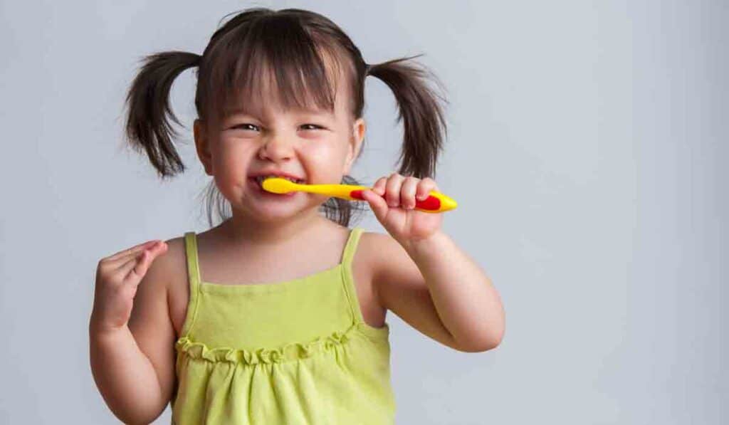 Child Brushing Teeth
